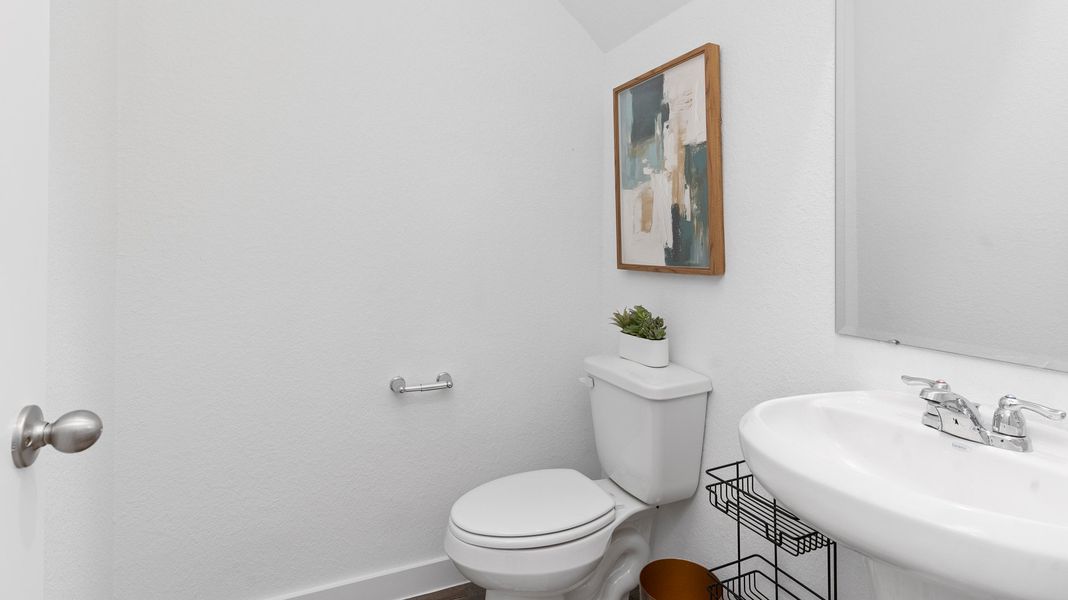 Representative furnished interior of a home built from the BOXWOOD by D.R. Horton in Legacy Village, Houston (Image 15).