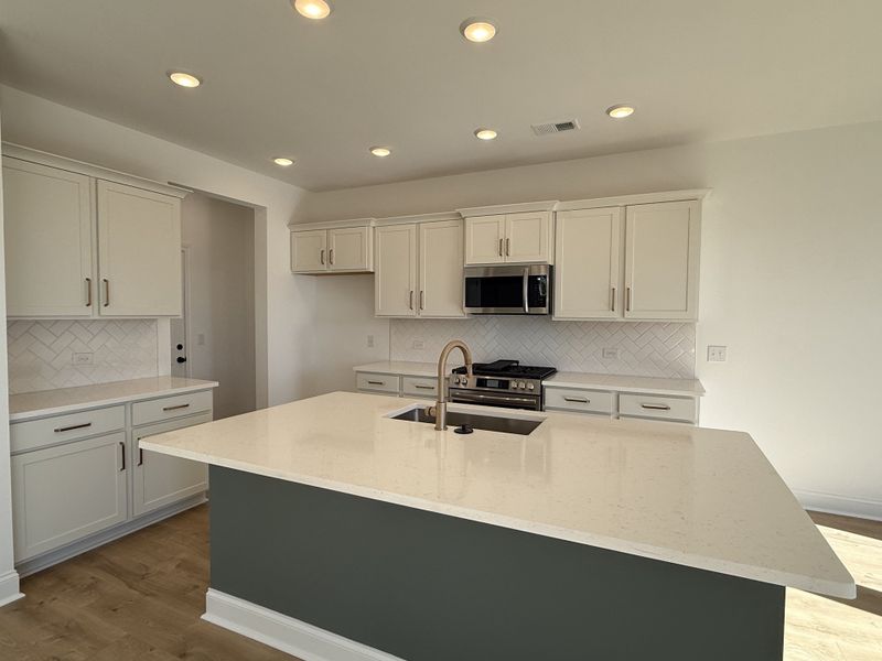 Furnished interior view inside a new home in Nexus – Park Collection, Gallatin (Image 8).