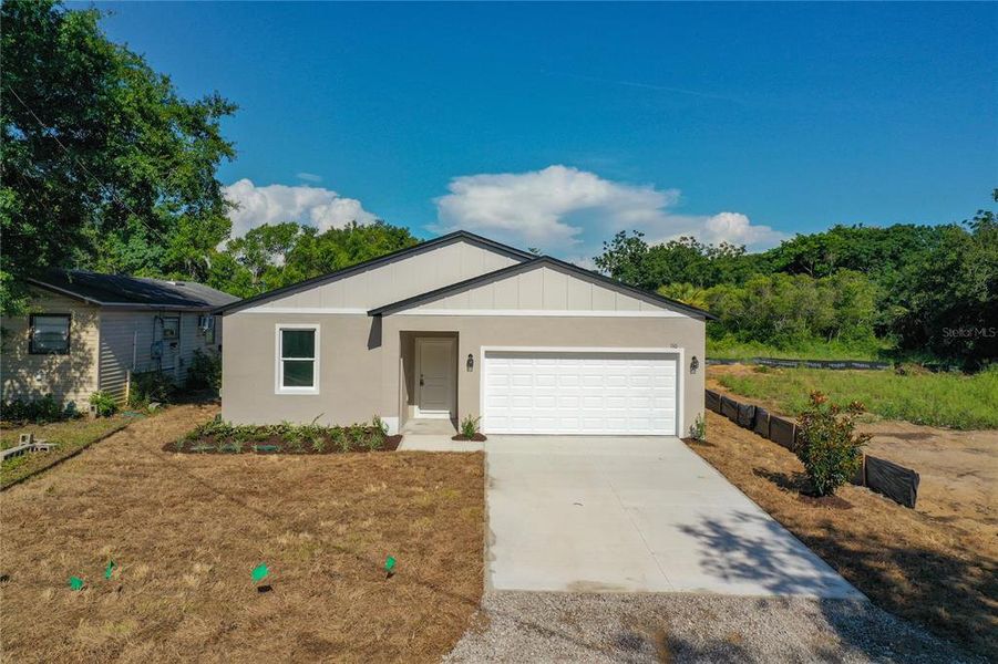 Front exterior of a new home in , Eustis, FL, highlighting curb appeal (Image 20). Front exterior of a new home in , Eustis, FL, highlighting curb appeal (Image 20).