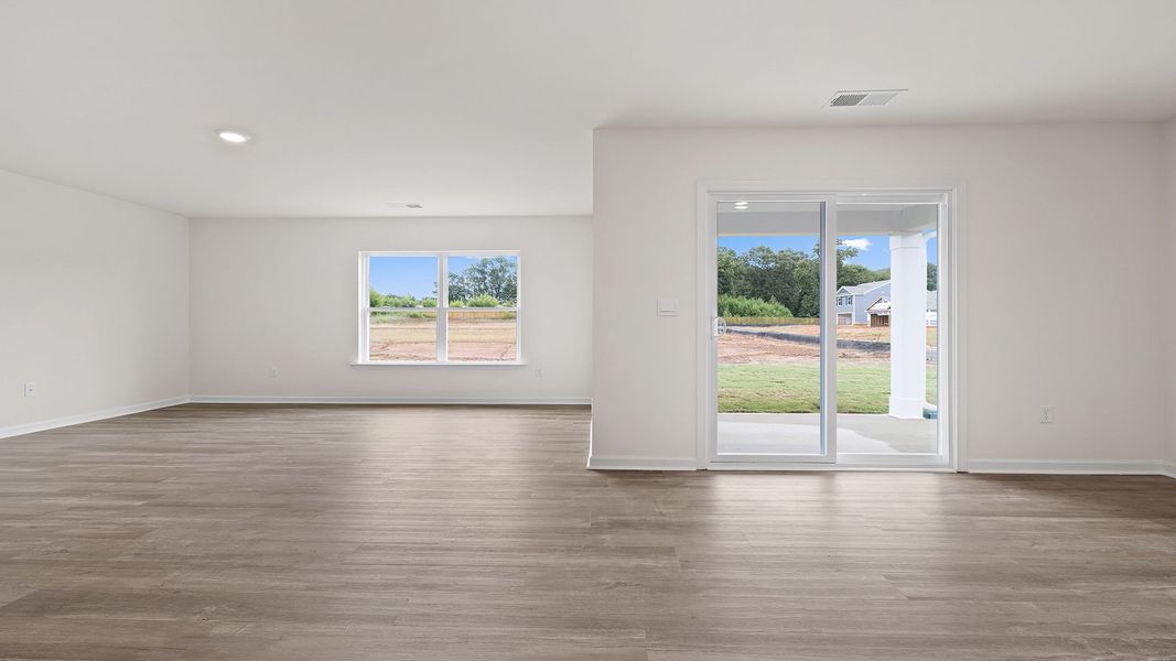 Spacious, unfurnished interior of a new home in Bentley Park, Greenwood (Image 21).