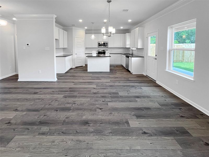 The McGinnis- Family Room into Kitchen. The McGinnis- Family Room into Kitchen.