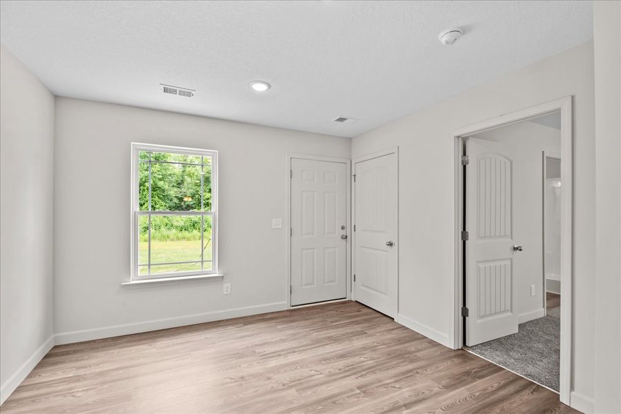 Representative unfurnished interior of a home built from the Elliott by Enchanted Homes in Arcadia Village, Spartanburg (Image 23). Representative unfurnished interior of a home built from the Elliott by Enchanted Homes in Arcadia Village, Spartanburg (Image 23).
