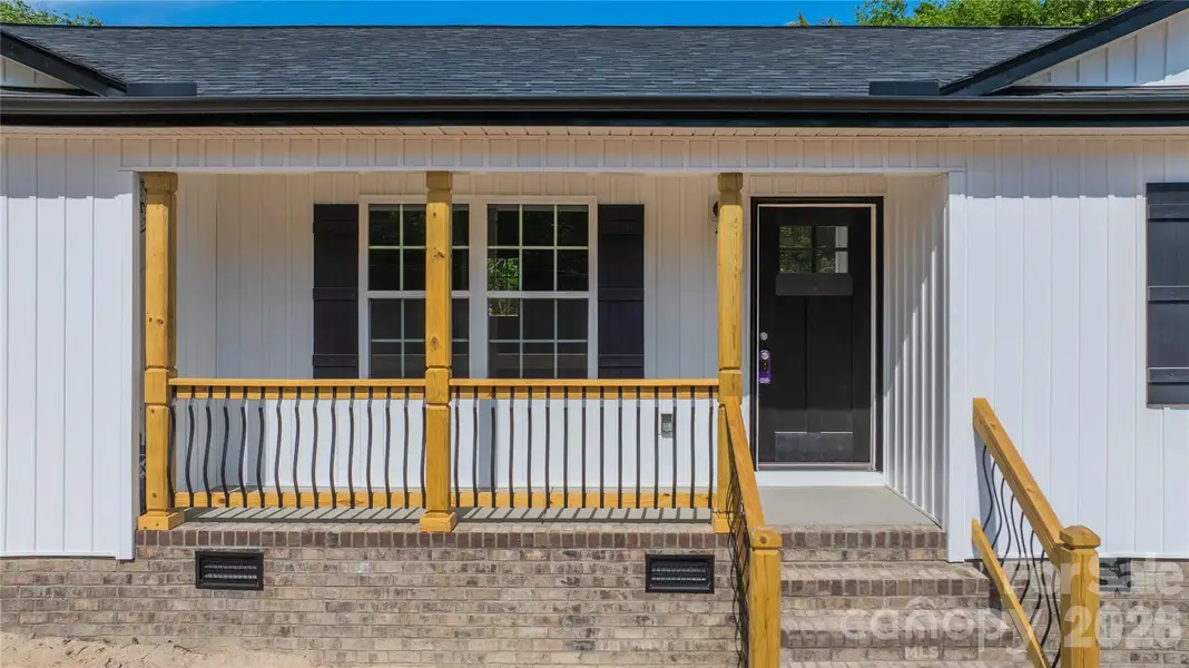 Covered concrete front porch