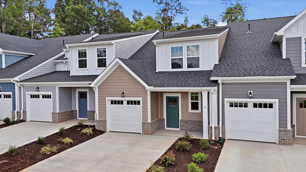 Front exterior of a new home in Pelham Crossing Villas, Greenville, SC, highlighting curb appeal (Image 23). Front exterior of a new home in Pelham Crossing Villas, Greenville, SC, highlighting curb appeal (Image 23).