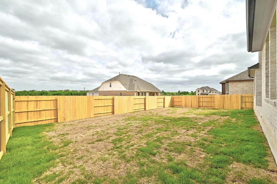 Exterior details and patio area of a home in Flora - 60', Hutto (Image 22).