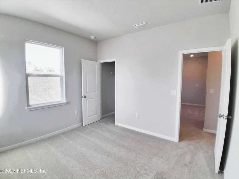 Spacious, unfurnished interior of a new home in Seminole Palms, Palm Coast (Image 16).
