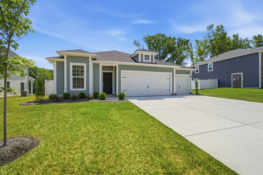 Front exterior of a new home in Brush Creek, Fairview, TN, highlighting curb appeal (Image 2). Front exterior of a new home in Brush Creek, Fairview, TN, highlighting curb appeal (Image 2).