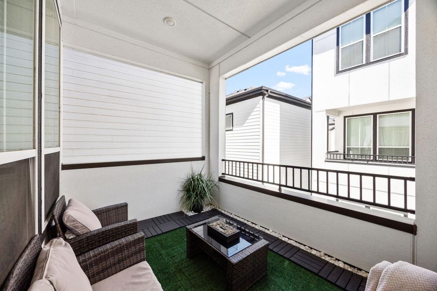 Exterior details and patio area of a home in The Corner At Buffalo Pointe, Houston (Image 24).