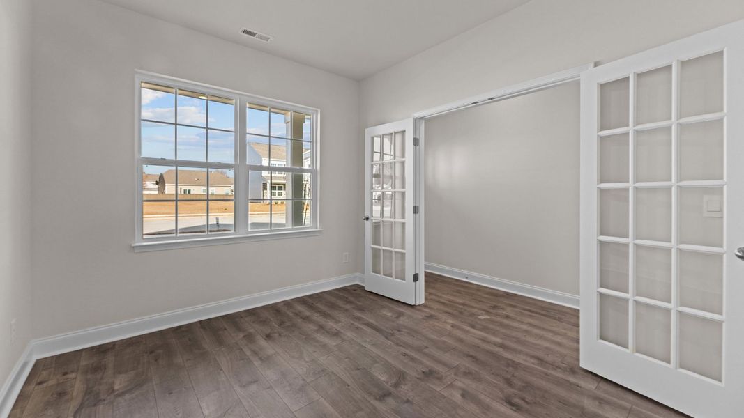 Representative unfurnished interior of a home built from the Belhaven by D.R. Horton in Tyler - Home on the Lake, New Bern (Image 8). Representative unfurnished interior of a home built from the Belhaven by D.R. Horton in Tyler - Home on the Lake, New Bern (Image 8).
