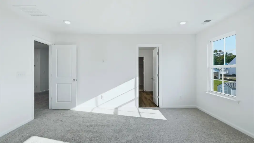 Bedroom 2 in the Pritchard provides comfort and versatility