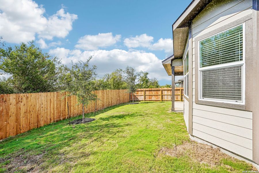 Exterior details and patio area of a home in Carmel Ranch, Schertz (Image 26).