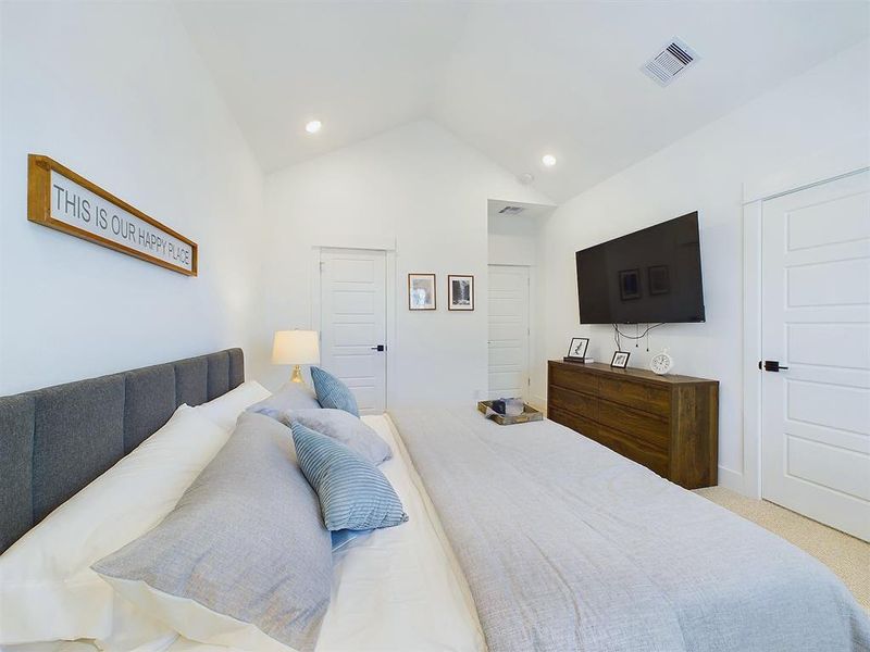 The elegant primary bedroom is located on the second floor. It features high ceilings recessed lighting, prewired and blocked for ceiling fans (not included). Please note that the photos are from another development by Disama Group, finishes and colors may vary.