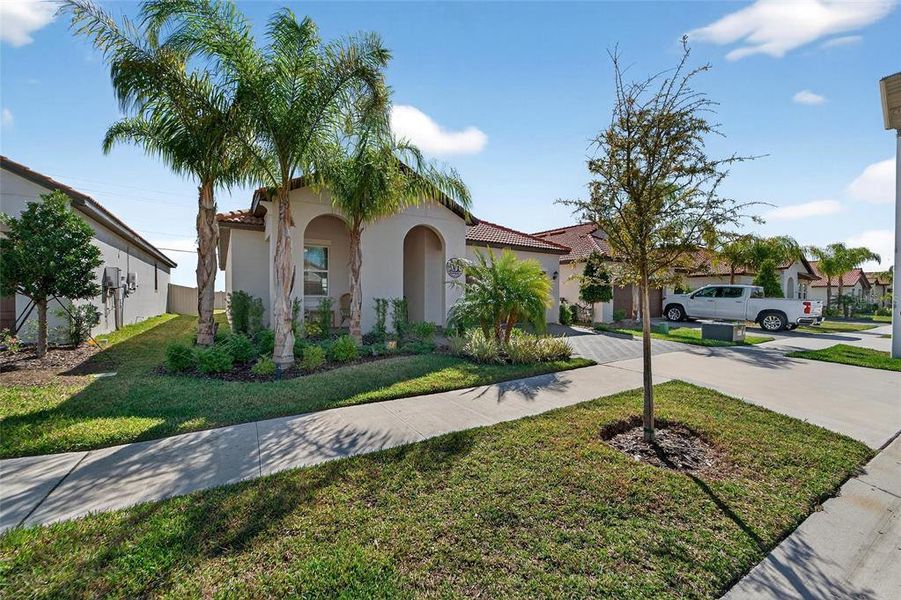 Front exterior of a new home in Southshore Bay Active Adult, Wimauma, FL, highlighting curb appeal (Image 26).