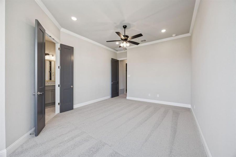 Large double door entry into primary bathroom.