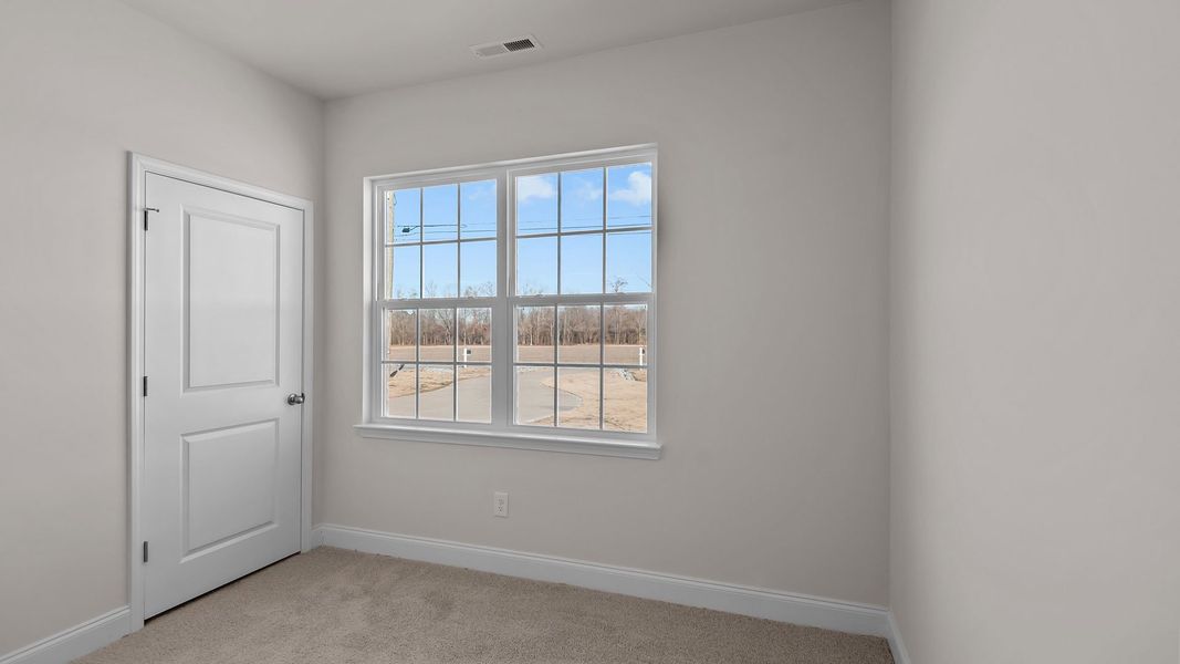 Spacious, unfurnished interior of a new home in Bedford Place, Wilson (Image 11). Spacious, unfurnished interior of a new home in Bedford Place, Wilson (Image 11).