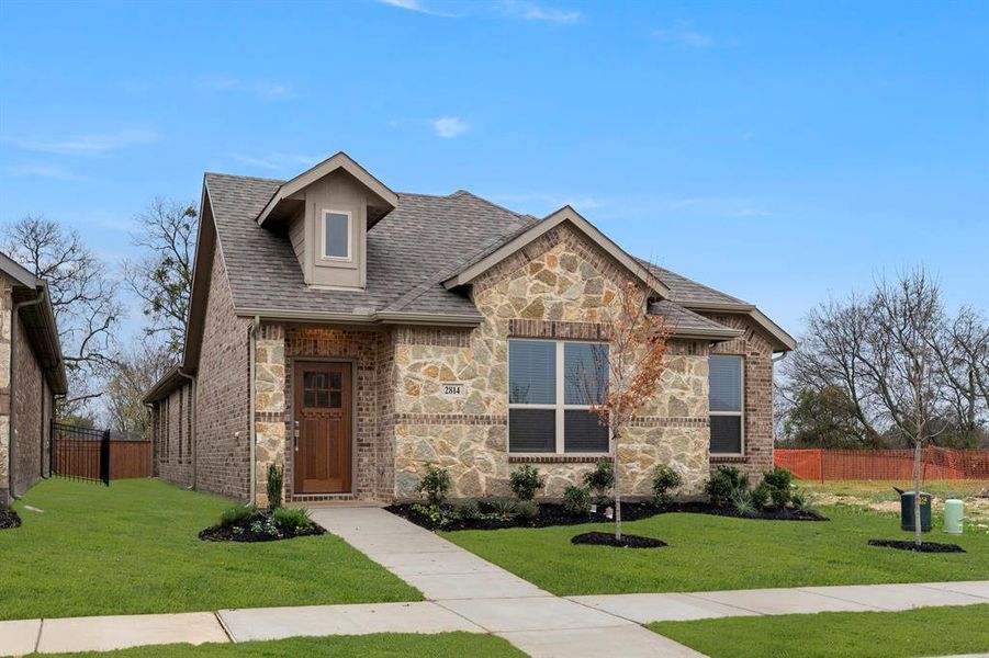 Front exterior of a new home in , Midlothian, TX, highlighting curb appeal (Image 1). Front exterior of a new home in , Midlothian, TX, highlighting curb appeal (Image 1).