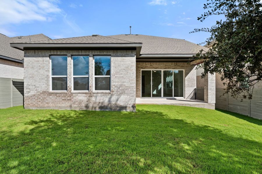 Exterior details and patio area of a home in Wolf Ranch, Georgetown (Image 25).