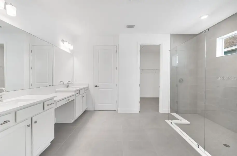 Furnished interior view inside a new home in Harvest at Ovation, Winter Garden (Image 5). Furnished interior view inside a new home in Harvest at Ovation, Winter Garden (Image 5).