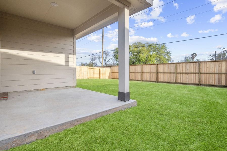 Exterior details and patio area of a home in Riverwood Ranch, Angleton (Image 3).