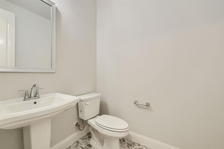 Bathroom with toilet and sink