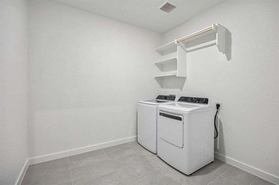 Utility Room in the Wimbledon home plan by Trophy Signature Homes – REPRESENTATIVE PHOTO Utility Room in the Wimbledon home plan by Trophy Signature Homes – REPRESENTATIVE PHOTO