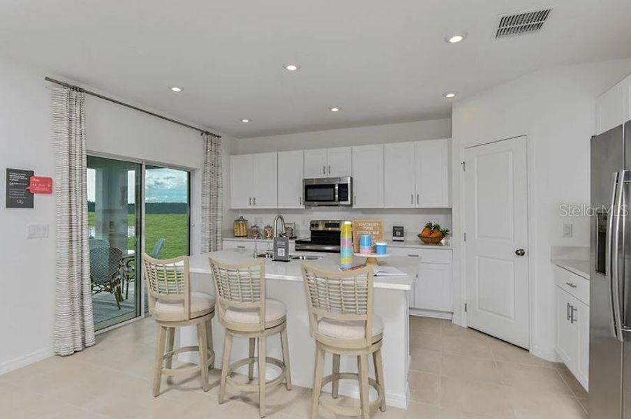 Furnished interior view inside a new home in Firethorn, Parrish (Image 15).