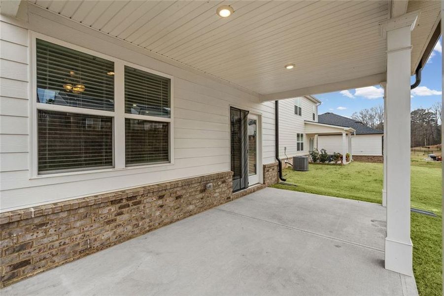 Exterior details and patio area of a home in Twin Lakes, Hoschton (Image 4).
