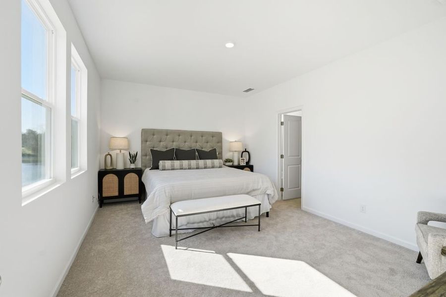 Representative furnished interior of a home built from the Norcross by Taylor Morrison in Windance Lake, Loganville (Image 28).