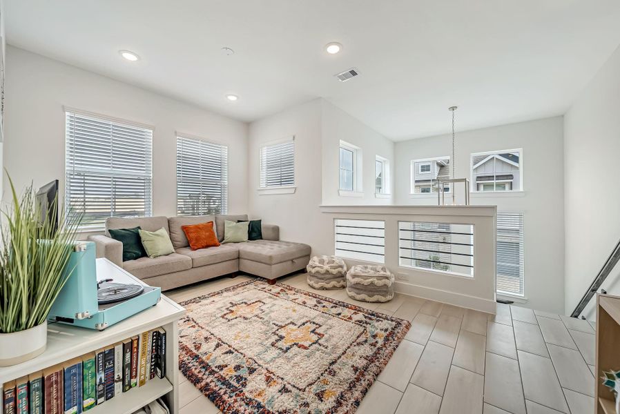 Furnished interior view inside a new home in The Groves, Humble (Image 11).