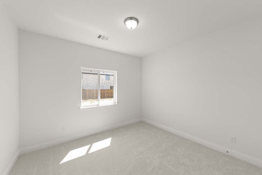 Spacious, unfurnished interior of a new home in The Reserve at Spiritas Ranch, Little Elm (Image 28).