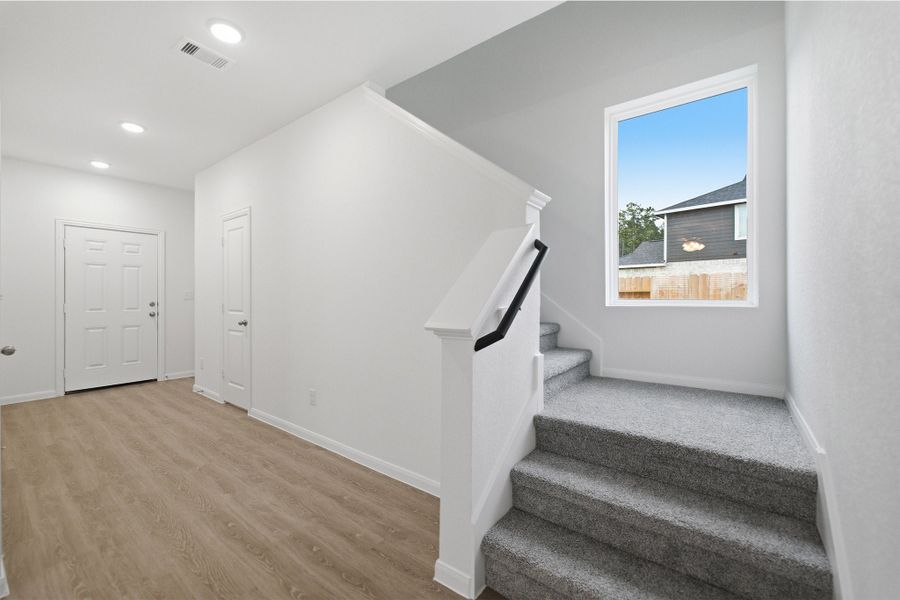 Spacious, unfurnished interior of a new home in The Canopies, Splendora (Image 26).