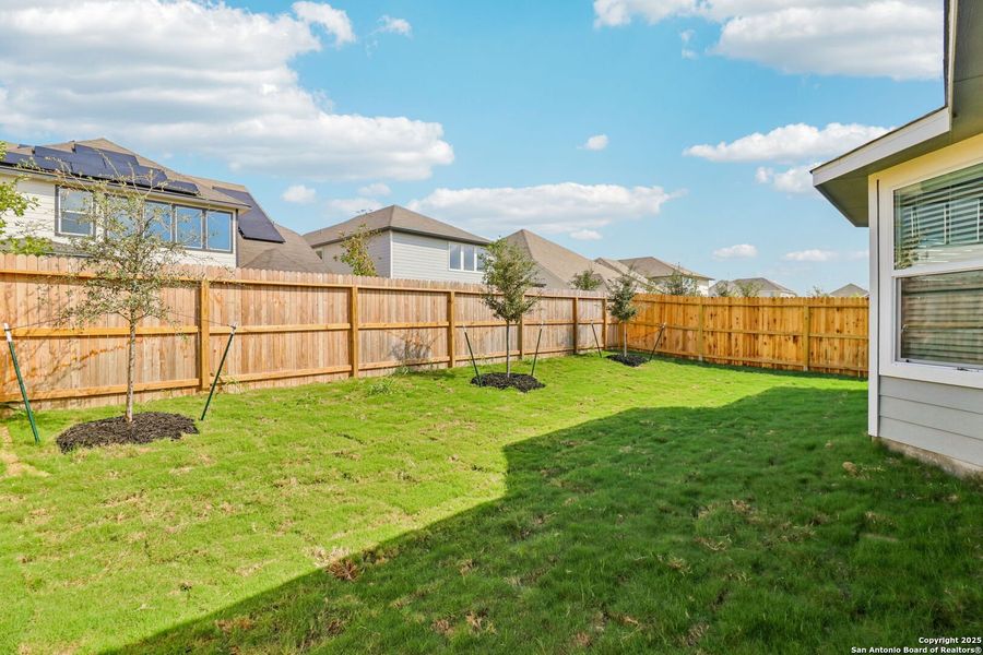 Exterior details and patio area of a home in Estancia Ranch - Premier Series, San Antonio (Image 3).