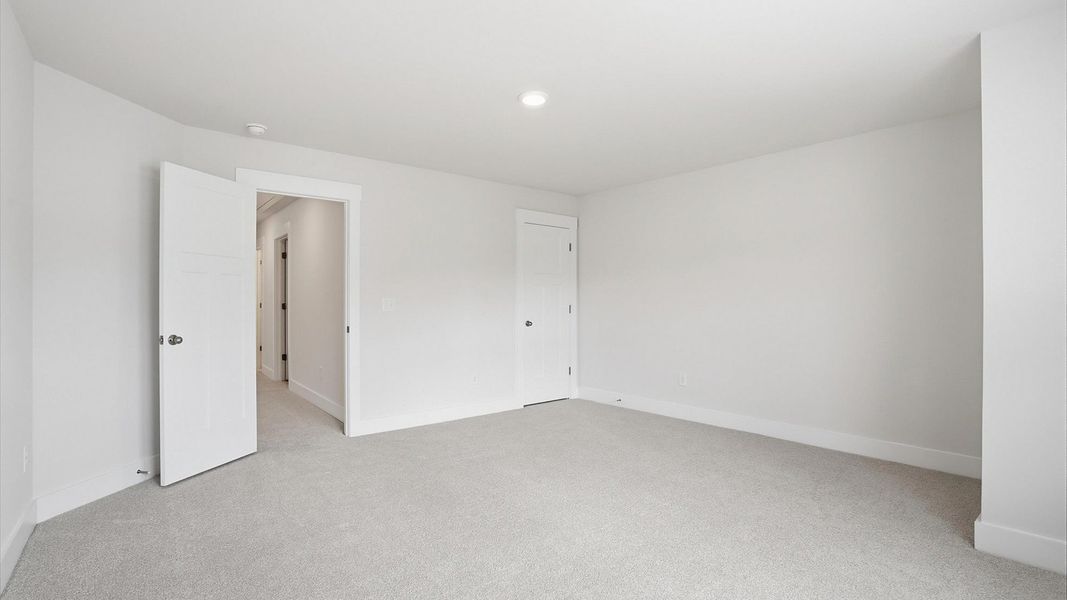 Furnished interior view inside a new home in Village at Midway, Anderson (Image 23).