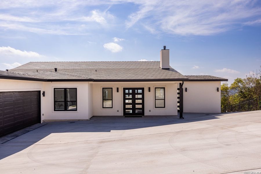 Exterior details and patio area of a home in , Kerrville (Image 32).