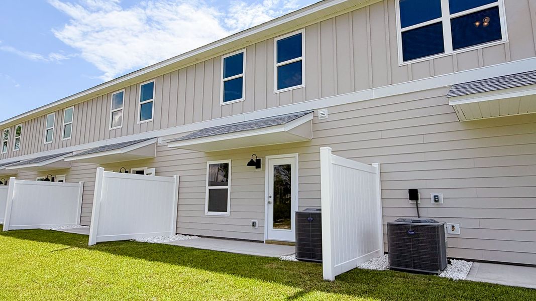 Exterior details and patio area of a home in WindMark Beach, Port Saint Joe (Image 3).
