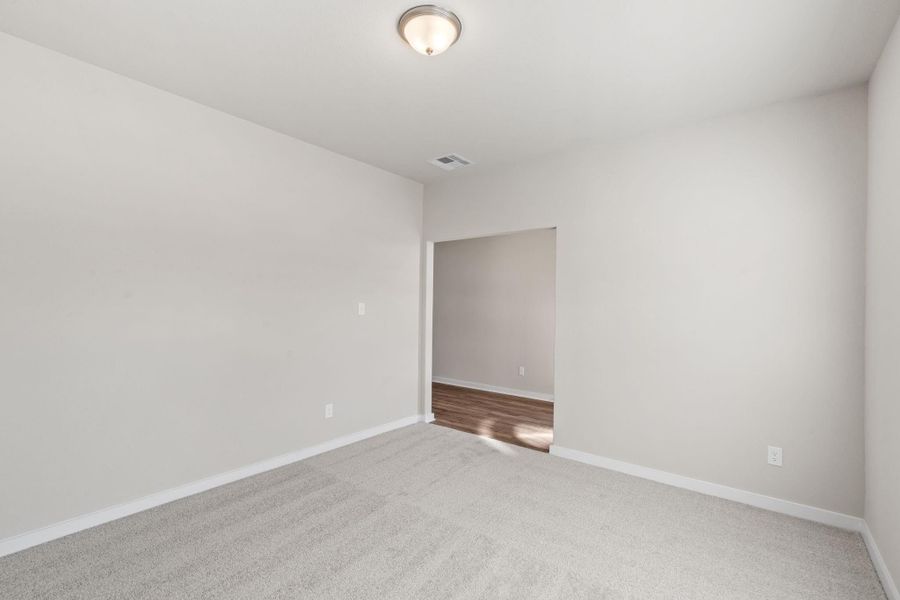 Spacious, unfurnished interior of a new home in Arabella on the Prairie 60', Richmond (Image 14).