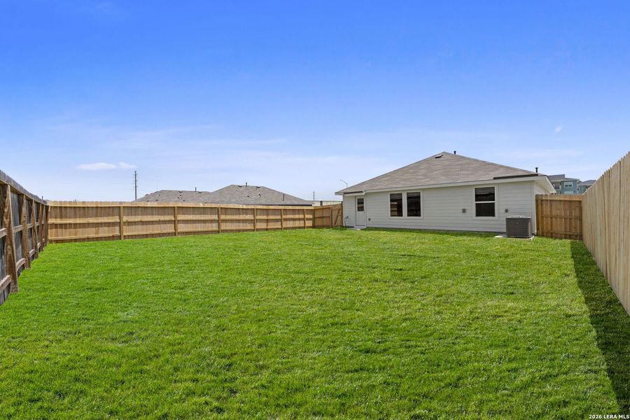 Exterior details and patio area of a home in Navarro Fields, Seguin (Image 2). Exterior details and patio area of a home in Navarro Fields, Seguin (Image 2).
