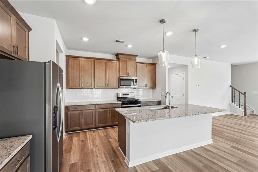 Furnished interior view inside a new home in Northwoods at Mirror Lake, Villa Rica (Image 8).