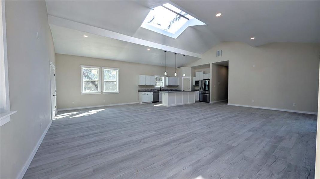 Large 28x31 open concept living, dining, kitchen Large 28x31 open concept living, dining, kitchen