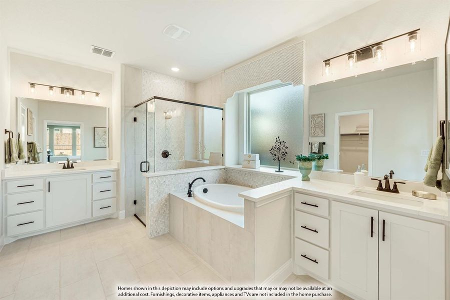 Master bathroom with dual vanities, soaking tub, glass walk-in shower, and white tile flooring