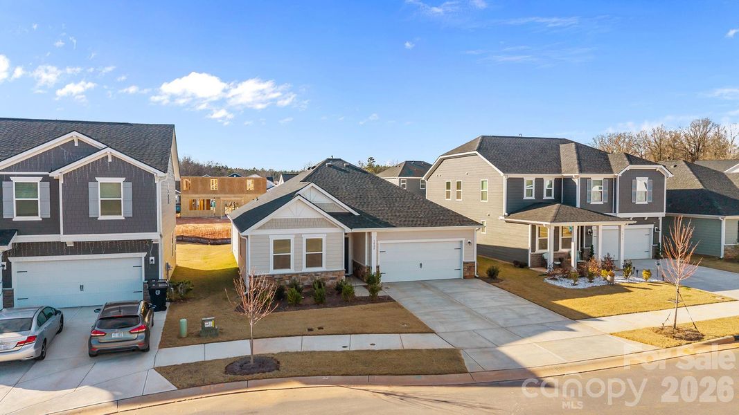 Front exterior of a new home in Sheffield, Indian Trail, NC, highlighting curb appeal (Image 27).