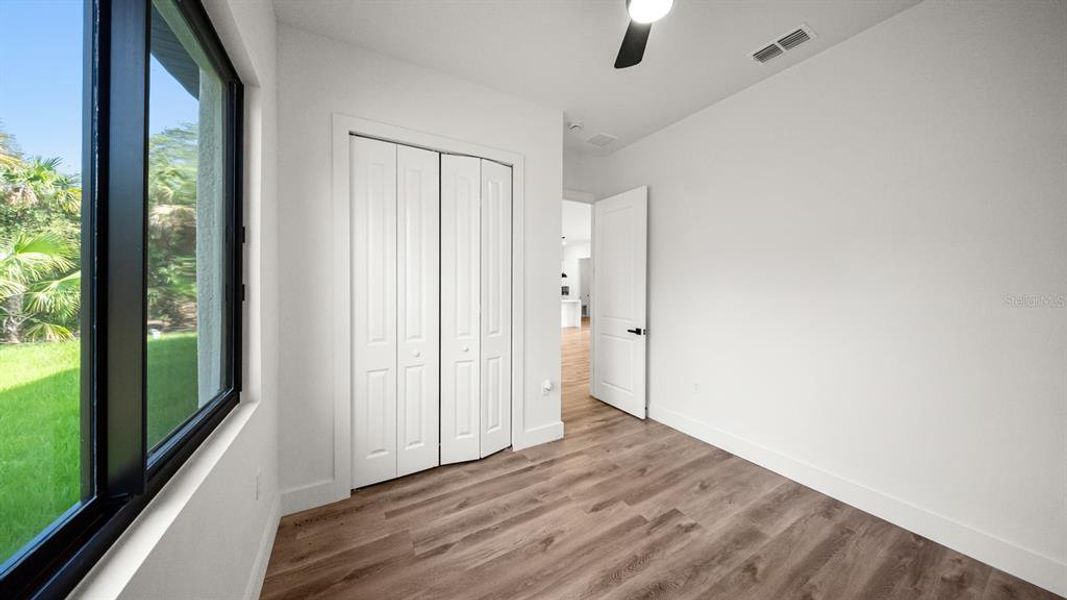 Spacious, unfurnished interior of a new home in , Port Charlotte (Image 37).