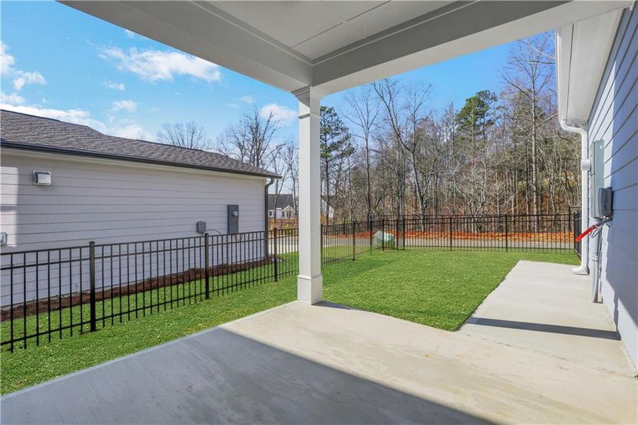 Exterior details and patio area of a home in Marble Tree, Ball Ground (Image 3).
