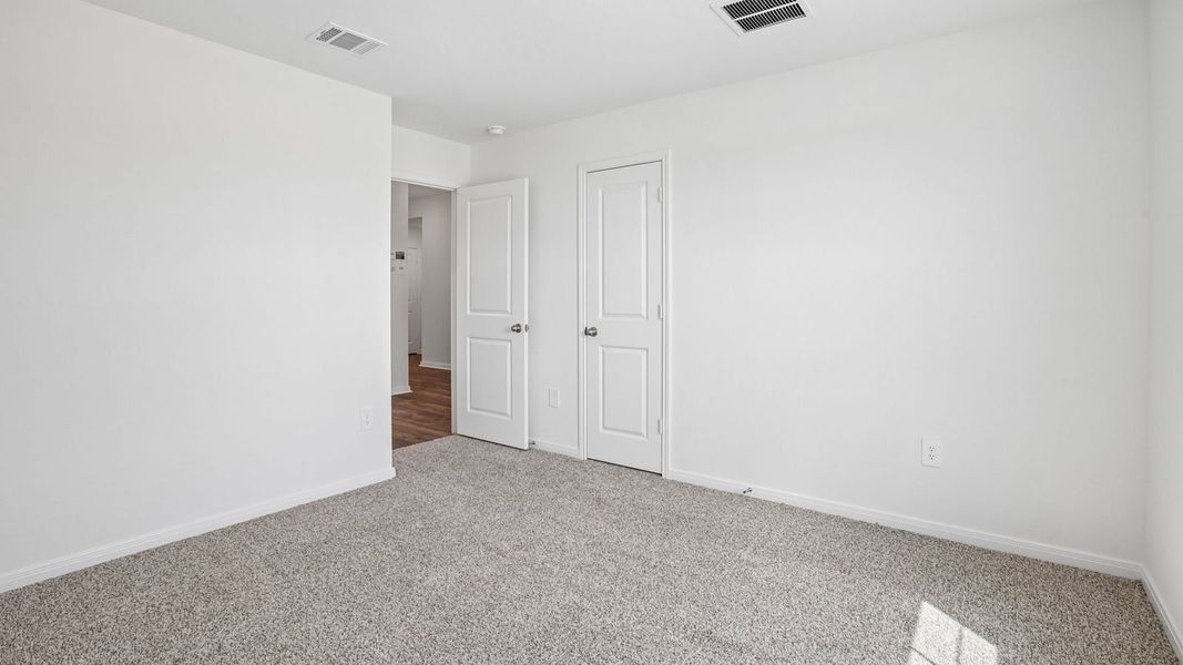 Spacious, unfurnished interior of a new home in Prairie Lakes, Buda (Image 32).