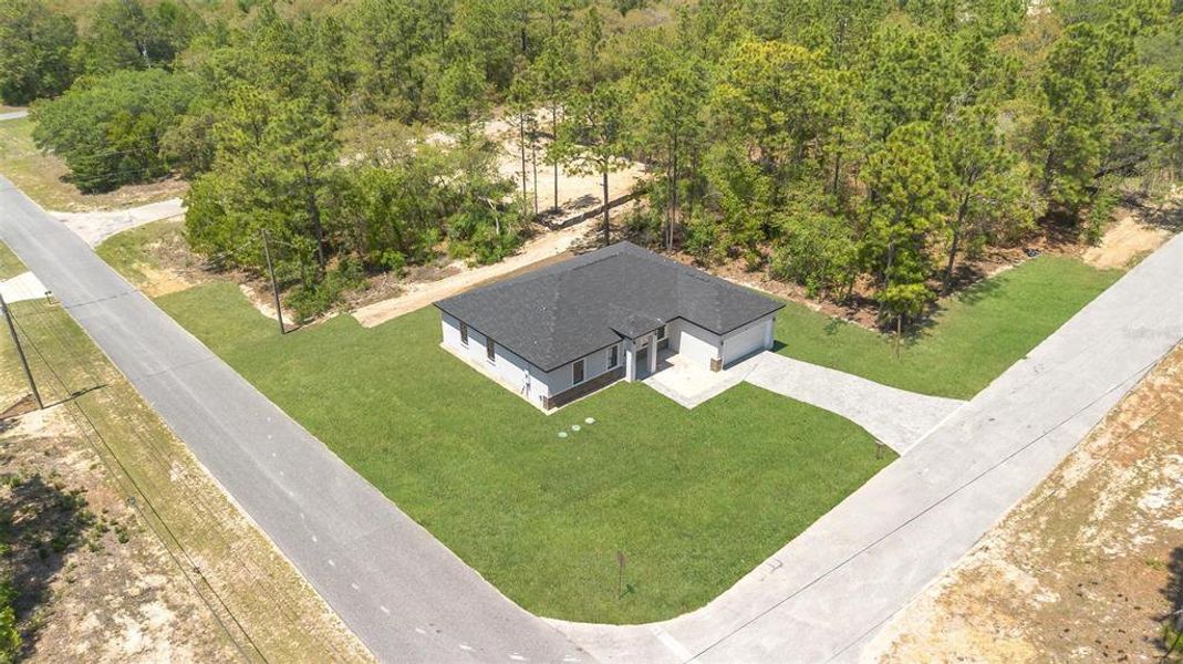 Front exterior of a new home in , Citrus Springs, FL, highlighting curb appeal (Image 24).