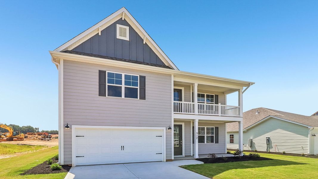 Front exterior of a new home in Shell Pointe, Gilbert, SC, highlighting curb appeal (Image 21).