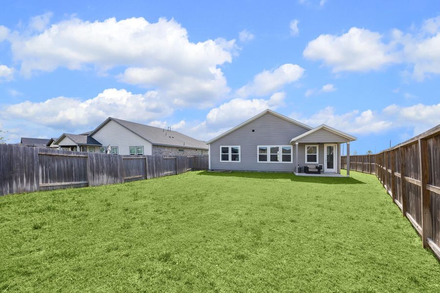 View of this home from the amazing back yard.