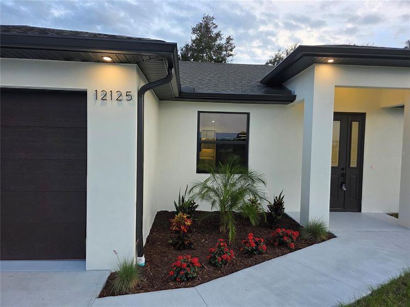 Exterior details and patio area of a home in , North Port (Image 32).
