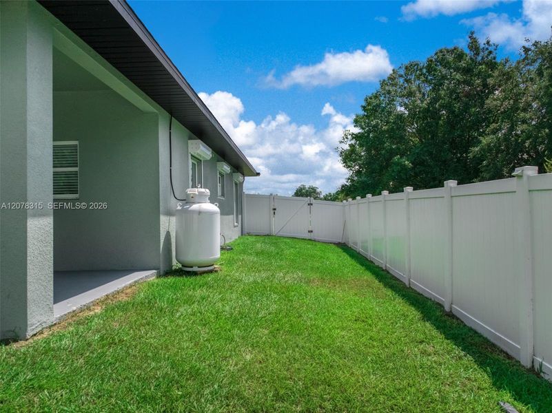 Exterior details and patio area of a home in , Sebring (Image 3).