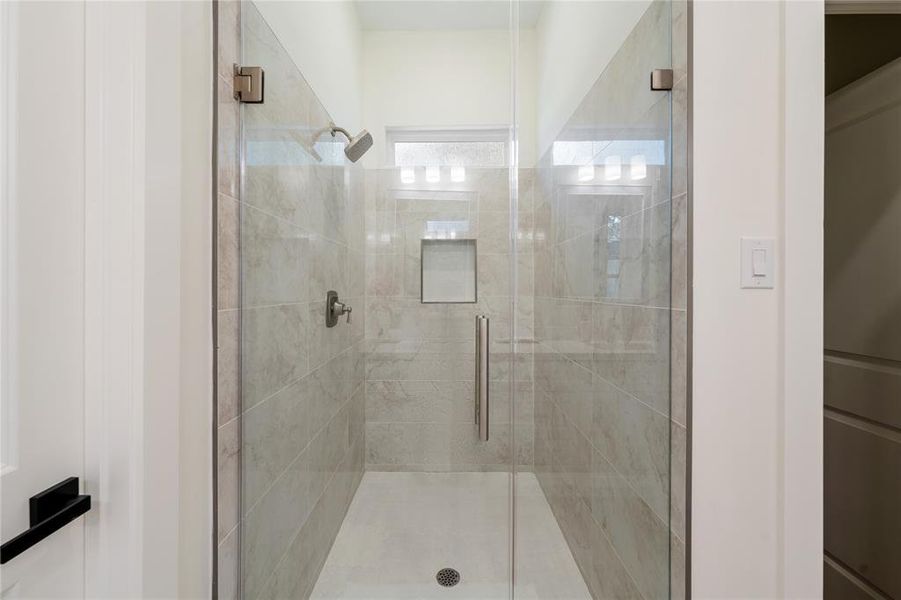 Oversized shower. One can easily stretch and find comfort.